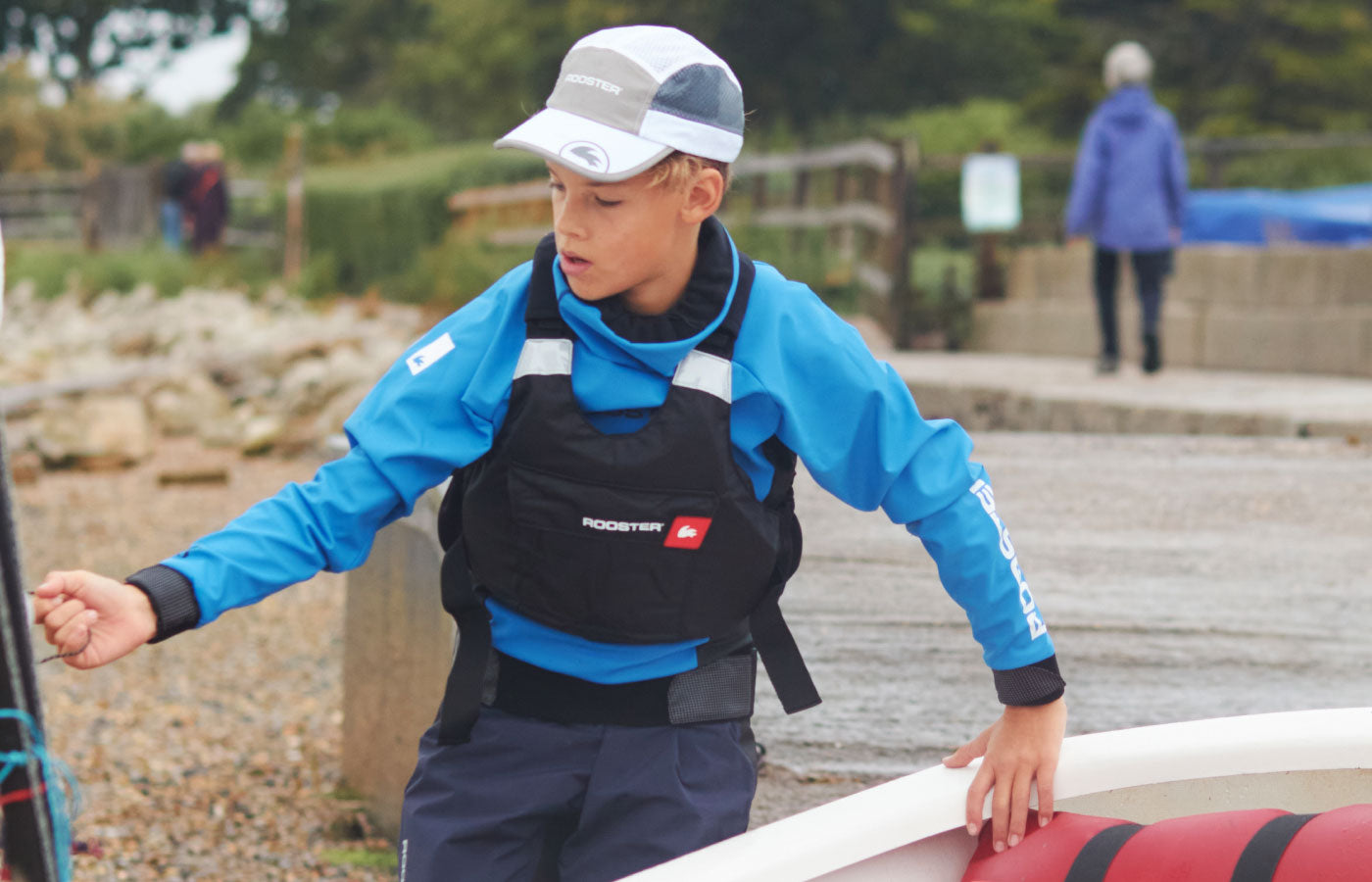 child rigging in pro lite aquafleece, overhead buoyancy aid and aeromesh cap