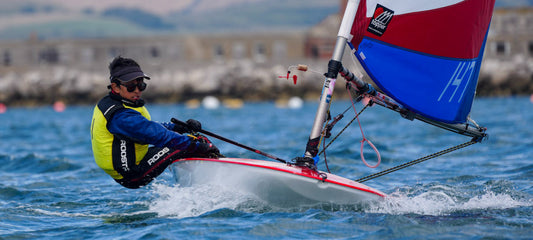 Hari Clark Sailing in his Topper.